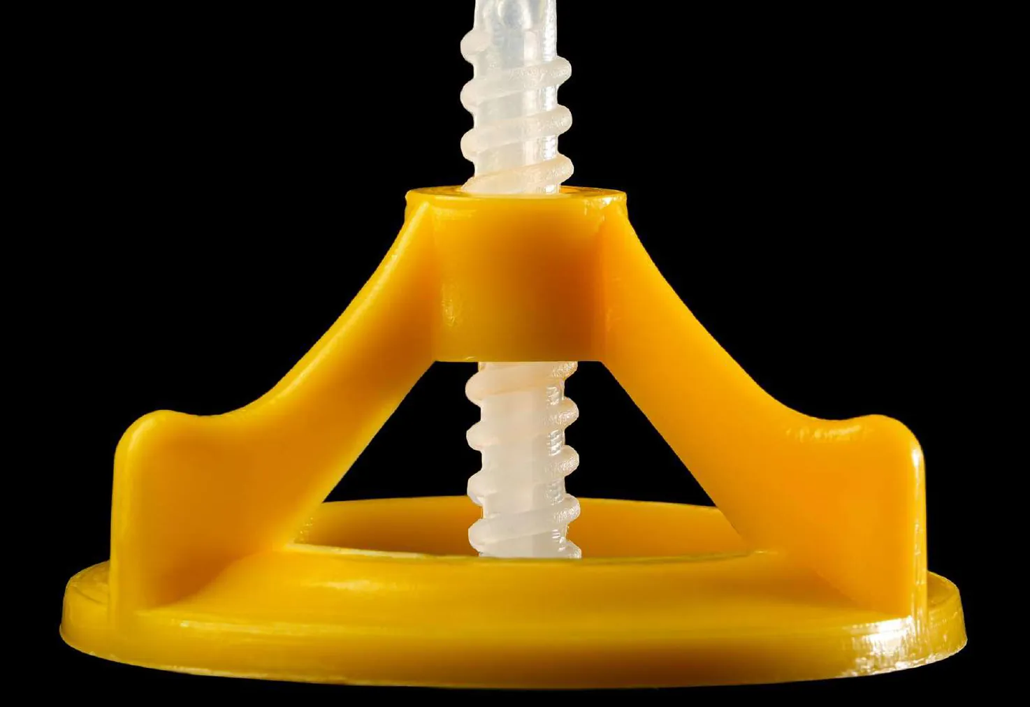 Gele spin cap ILM-CP-100 op een schroefclip